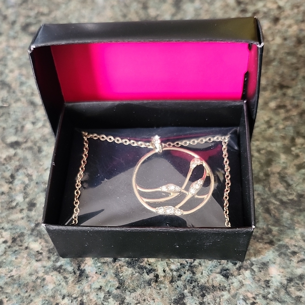 Avon Gold and Silver Circle Pendant Necklace